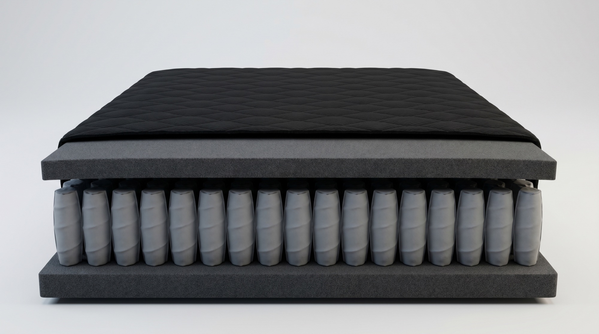 Cross-section of a black mattress showing the quilted cover, comfort foam and individually wrapped pocket springs